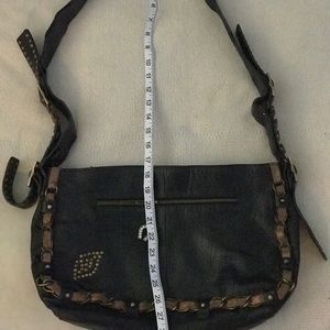 Betsy Johnson black leather purse.